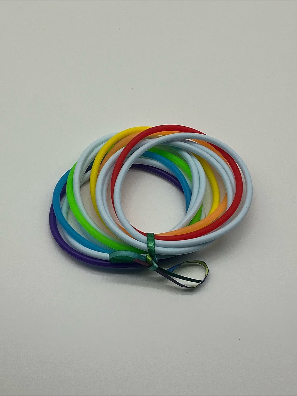 Set of 12 Pastel Blue and Rainbow Colored Jelly Bracelets